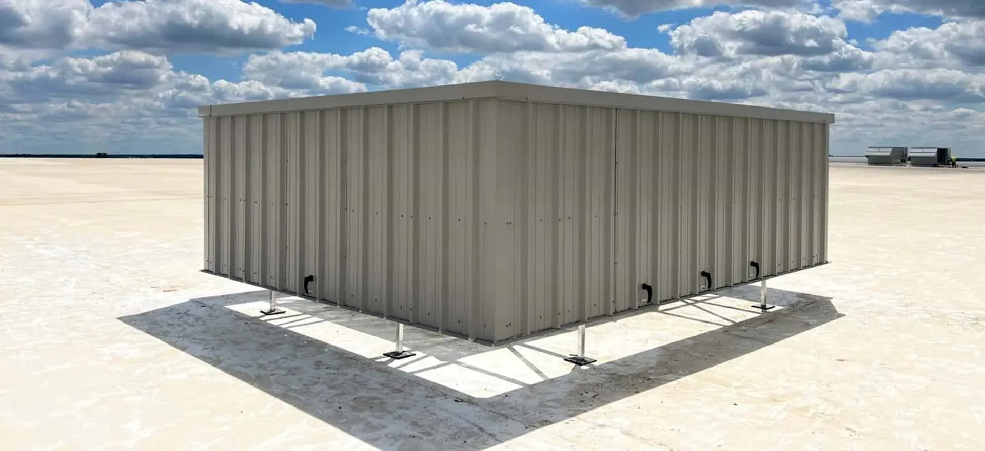 Commercial rooftop with mechanical equipment concealed by a custom steel RTU screen wall