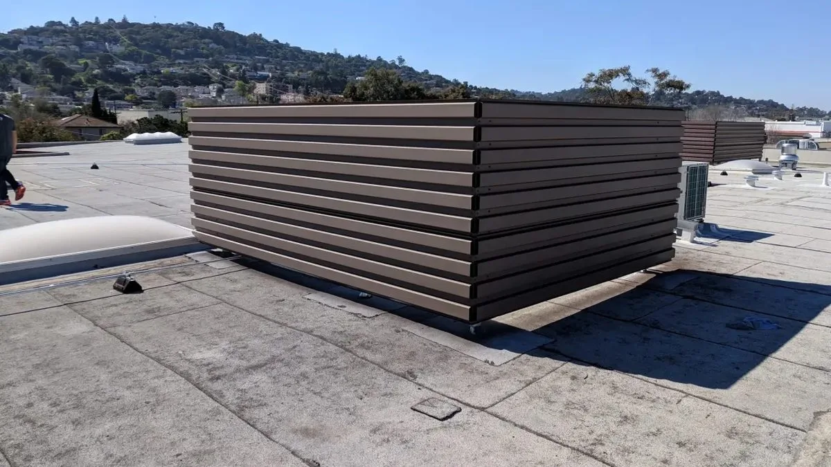 Cooling tower screening on an industrial commercial rooftop