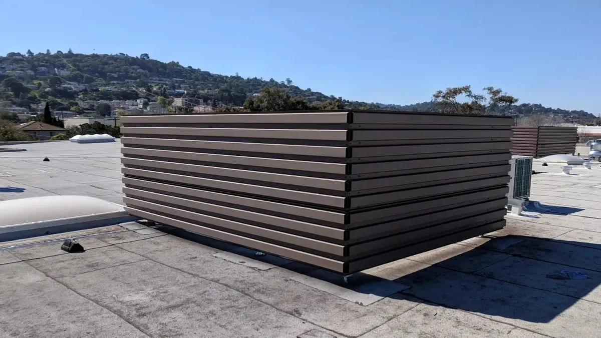 RTU support and framing for a commercial rooftop equipment screen